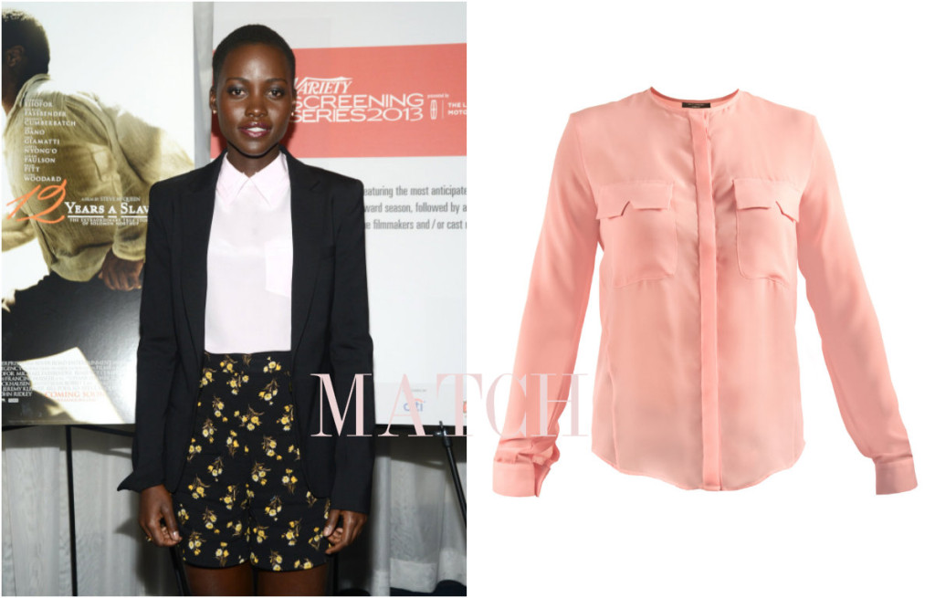 Lupita wears smart shirt with pocket flap similar to the Kitty Dolly shirt