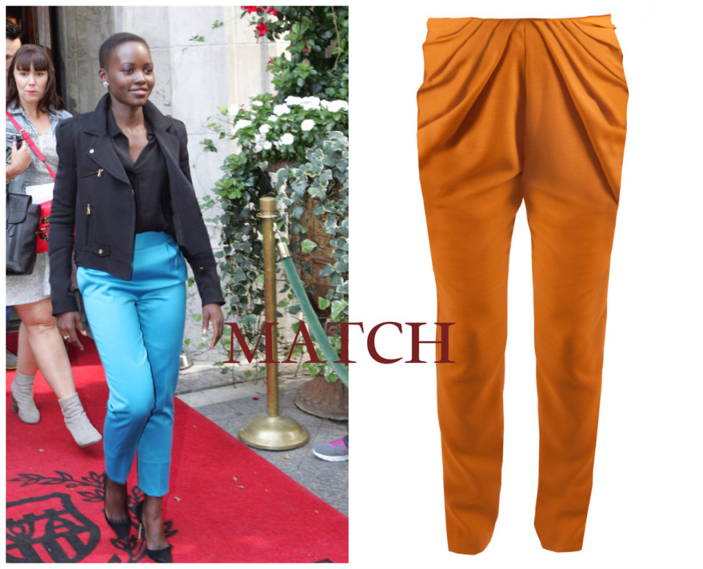 Lupita in tailored casual smart trousers similar to the Kitty Zephaniah trousers